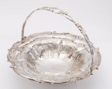 A Victorian silver swing handled fruit basket by George Angell & Co, London 1853,