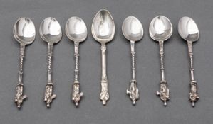 A set of five late 19th century Dutch cast silver tea spoons, import marks for B H Joseph & Co,