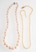 Two pearl necklaces, including a string of large 'ringed' freshwater pearls,