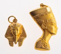 An Egyptian gold Nefertiti pendant charm and a Tutankhamun pendant charm,