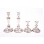 A pair of 19th century Sheffield plate candlesticks with detachable sconces, gadrooned rims, 23.5cm.