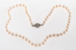 A cultured pearl necklace with diamond set clasp, a string of cultured pearls with pink overtones,