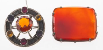 A carnelian brooch and a Scottish brooch, a rectangular brooch claw set with a plaque of carnelian,