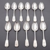 A matched set of eleven Newcastle Fiddle pattern dessert spoons, various dates, seven by Reid & Son,