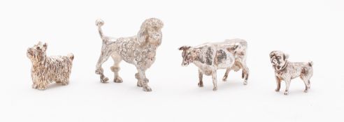 A mixed group of modern cast silver animals including; a Scots Terrier, a Standard Poodle,