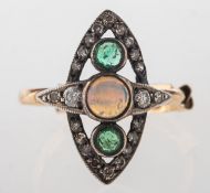 An opal, emerald and diamond ring, of Art Deco style and openwork navette form,