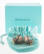 Tiffany & Co. A pair of heart padlock and key earrings,