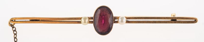 A garnet & pearl brooch and a pair of garnet earrings, a bar brooch,