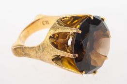 A smokey quartz cocktail ring,
