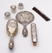A mixed group of silver including; a Elizabeth II dressing table set Henry Bushell & Co,