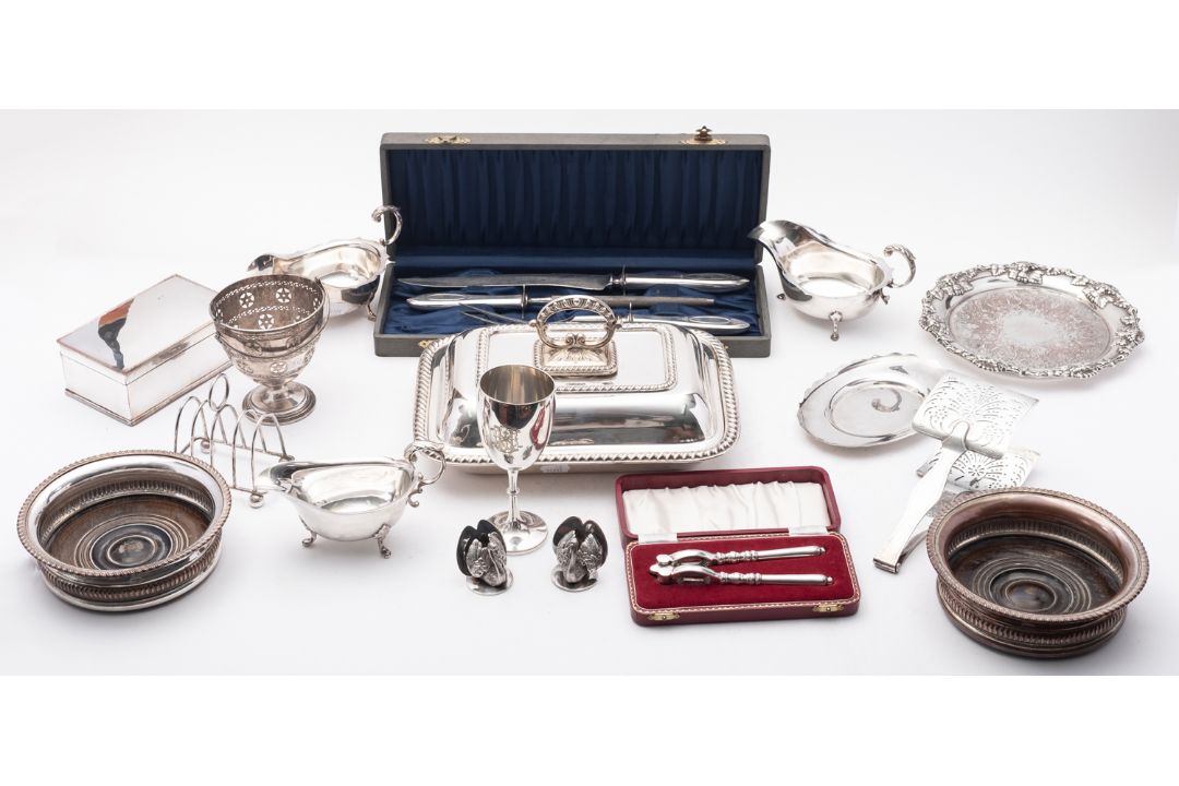 A mixed group of silver plate including; a Sheffield plate cigarette casket,