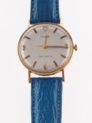 Tudor a gentleman's 9K gold wristwatch the round silvered dial having raised baton and Arabic