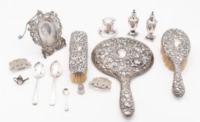 A mixed group of silver including; a silver dressing table set by Davis, Moss & Co, Birmingham 1928,