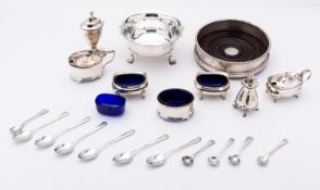 A mixed group of silver including; an Elizabeth II decanter coaster by William Comyns & Sons Ltd,