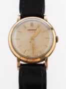 Longines a gentleman's 9k gold wristwatch the cream dial with inner ringed decoration,