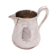 A small Victorian silver jug maker's mark almost rubbed out, London 1866, of baluster form,