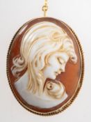 A 9ct gold cameo brooch, a cameo of a maiden in a 9ct gold plain and rope twist mount, safety chain,