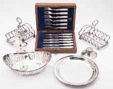 A mixed group of silver plate including; a matched pair of early 20th century seven bar toast racks,