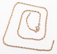 A faceted link chain, unmarked, length approx. 46.0cm, 5.5grams.