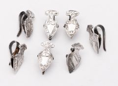 A matched group of silver napkin clips, various makers and dates, shield design, hook and clip, 32.