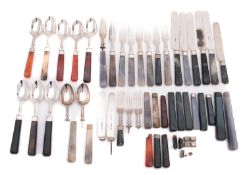 A Victorian silver-gilt and agate handled part dessert canteen by Frederick Elkington,