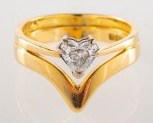 An 18ct gold heart-shaped diamond ring, a double conjoined ring, consisting of a wishbone ring,
