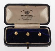 A boxed set of three 18ct gold dress studs, UK hallmark, maker's mark OP, total gross weight 2.