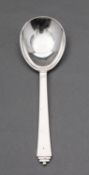 A mid 20th century Danish silver server spoon by Georg Jensen, 1915-1930,