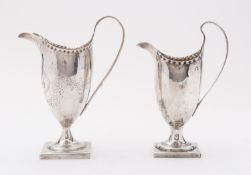 A George III silver cream jug maker's mark rubbed possibly by Hester Bateman, London 1787,