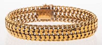 A fancy link bracelet, an openwork herringbone style link bracelet, push-in clasp,