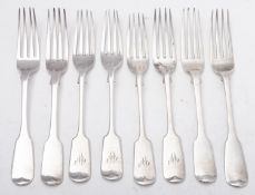 A mixed group of silver flatware including; eight various Fiddle pattern table forks, mostly London,