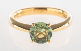 An 18ct gold green sapphire ring, claw set with a circular-cut green sapphire, sapphire approx. 0.