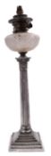 A Victorian silver and glass Corinthian column oil lamp by Goldsmiths & Silversmiths Co Ltd,