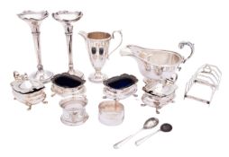 A mixed group of silver including; a pair of Chester silver trumpet vases- marks almost rubbed out,