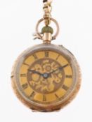 A lady's 9K gold open-faced pocket watch the gold dial with matted and engraved centre,