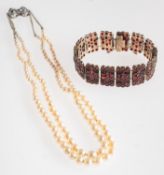 Two items of jewellery, including an Bohemian garnet set articulated bracelet,