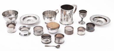 A mixed group of silver including; a George V christening mug by James Dixon & Sons Ltd,