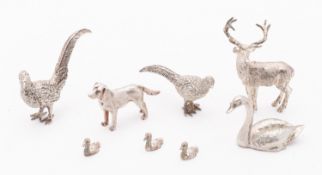 A mixed group of Elizabeth II cast animal figures by S.J.L.