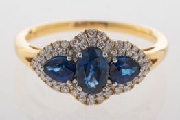 An 18ct gold sapphire and diamond ring,