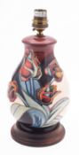 A Moorcroft pottery table lamp, tube lin