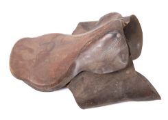 Three early 20th century brown leather s
