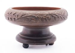 A carved Black Forest musical comport.