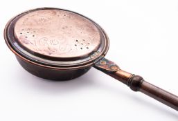 A 19th century copper warming pan, with