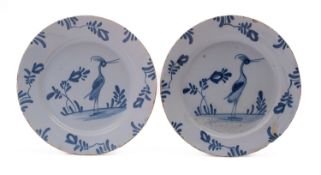 A pair of Bristol blue and white delftware plates,