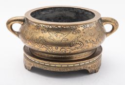 A large Chinese polished bronze 'dragon' censer and stand,