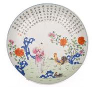 A Chinese famille rose 'chicken and boy' saucer dish, late Qing/Republic enamelled with a boy,