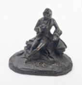 A Continental patinated bronze model of a gentleman,
