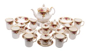 A Royal Albert Old Country Roses part tea service, comprising a tea pot and cover [damage to spout],