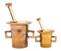 Two Continental, probably Dutch or German brass mortars with pestles,