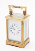 An Edwardian French Corniche Carriage clock the eight-day duration timepiece movement having a